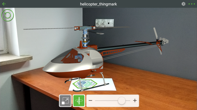 Grafika przedstawiająca model wyświetlony w rzeczywistości rozszerzonej na znaczniku ThingMark.